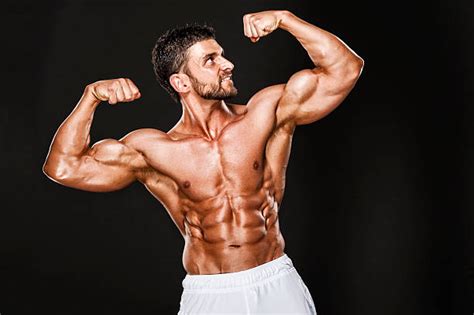 muscular men flexing|Bodybuilder Flexing Pictures, Images and Stock Photos